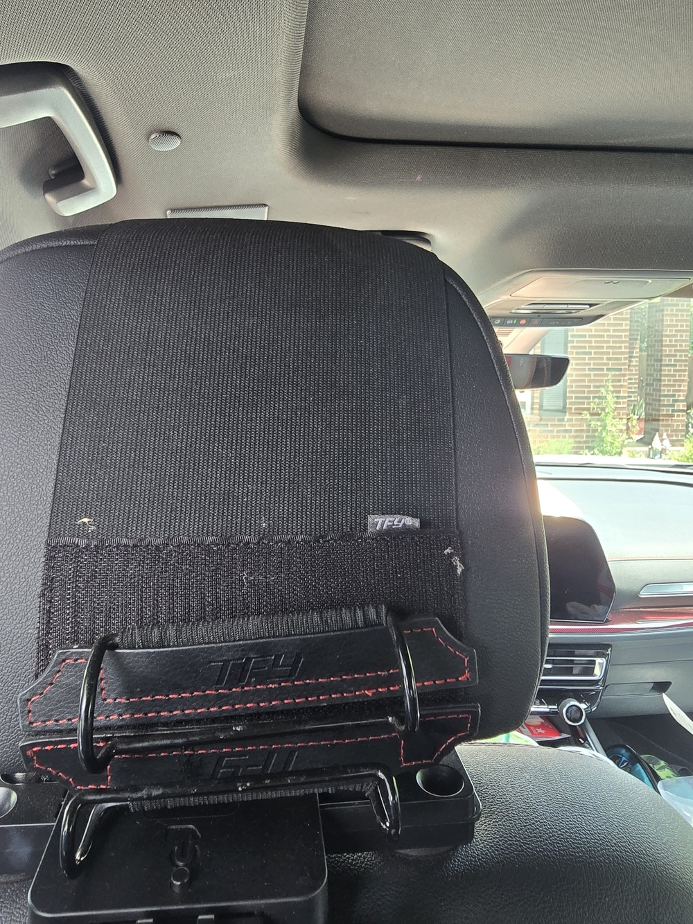 Car Headrest Tablet Holder with Black and Red Accent